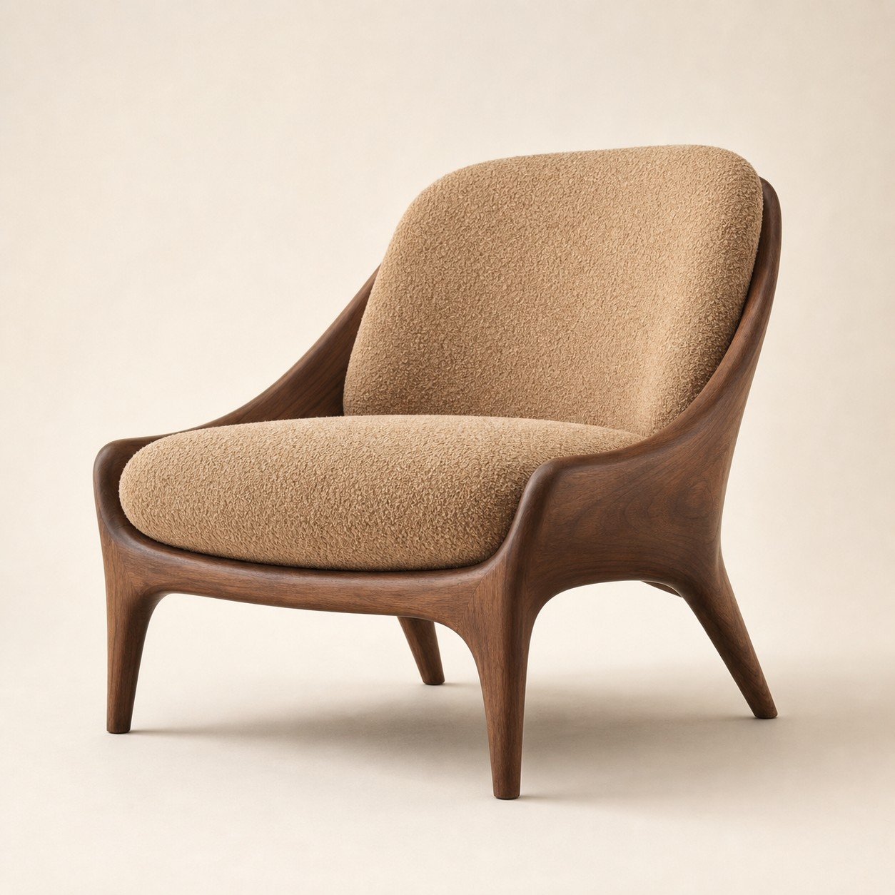 Studio product shot of a sculptural walnut lounge chair with smooth curves, low slung silhouette, single thick camel-colored boucle cushion, tapered legs, isolated on a seamless light cream backdrop with soft natural shadow — the reference shot for the image-to-image edit