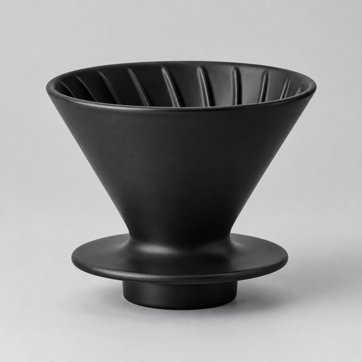 Reference 1: matte black ceramic pour-over dripper